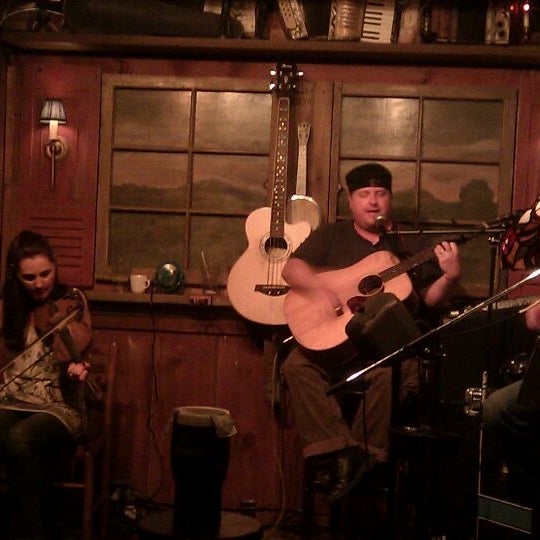 Photo taken at The Field Irish Pub &amp; Eatery by Michael N. on 9/8/2011