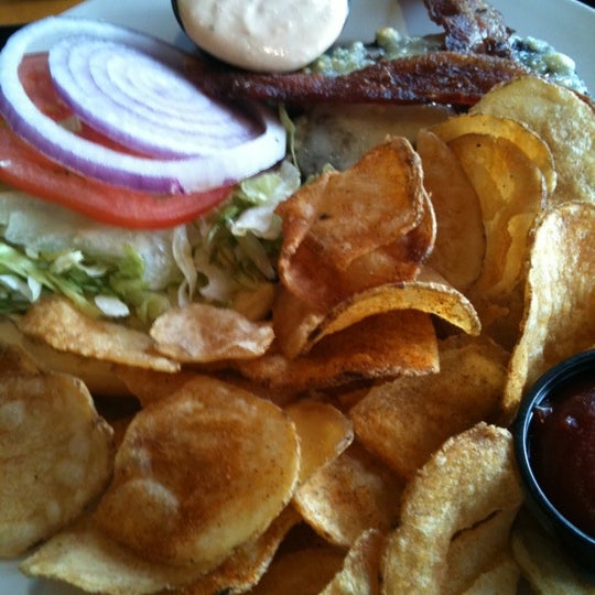 Photo taken at Canyons Restaurant &amp; Bar by Jim Y. on 6/21/2012