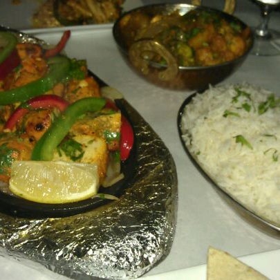 Photo taken at TAVA Contemporary Indian Cuisine by Zakir M. on 12/6/2011