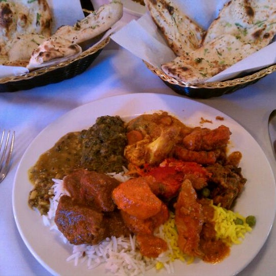 Photo taken at India&#39;s Tandoori Halal Restaurant by Brandon T. on 12/3/2011