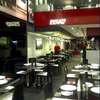 Photo taken at Ducati Caffe by Madiha on 5/26/2012