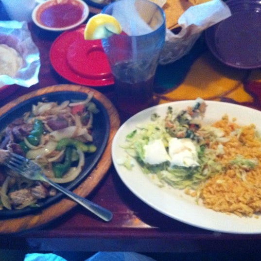 Photo taken at Charanda Mexican Grill &amp; Cantina by Arun R. on 5/1/2011