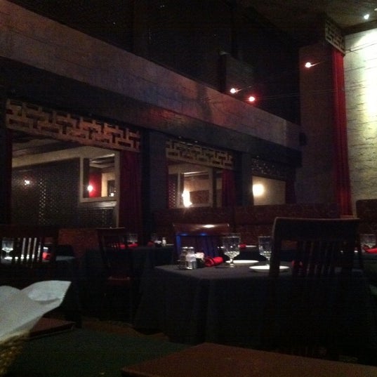 Photo taken at Gandhi India&#39;s Cuisine by Leah H. on 8/21/2011