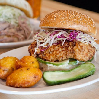 Try the fried chicken sandwich—fowl soaked in jalapeño-spiked buttermilk, fried to order & served in a Caputo’s bun with crunchy red cabbage–cilantro slaw. It’s 1 of our #100best dishes & drinks 2011.