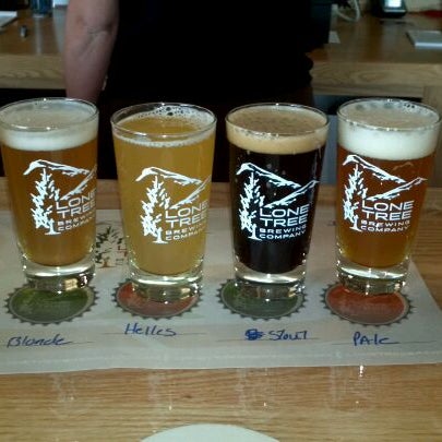 Photo taken at Lone Tree Brewery Co. by Tyler W. on 12/12/2011