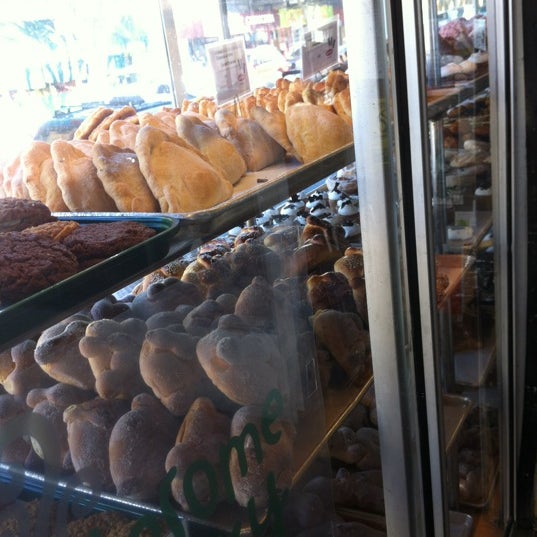 Photo taken at La Victoria Mexican Bakery &amp; Cafe by Lance K. on 10/30/2011