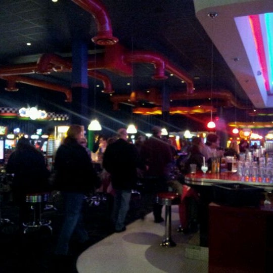 Photo taken at Dave &amp; Buster&#39;s by y c. on 12/18/2011