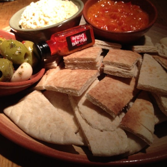 Photo taken at Nando&#39;s by Kirsty R. on 9/5/2012