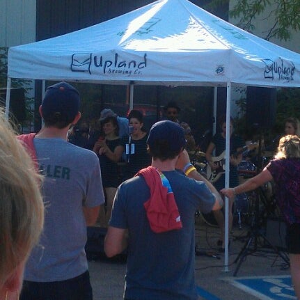 Photo taken at Upland Brewing Company Brewery &amp; Tasting Room by Katie B. on 7/15/2012