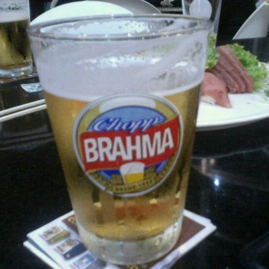 Photo taken at Quiosque Chopp Brahma by Chandall V. on 4/4/2012