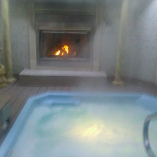 Photo taken at Oasis Hot Tub Gardens by T f win S. on 2/18/2012