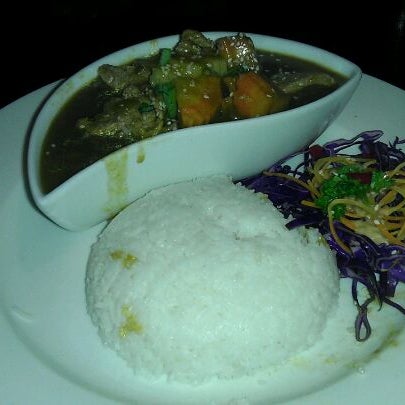 Photo taken at Sen-Thai Asian Bistro by Chris M. on 4/16/2012