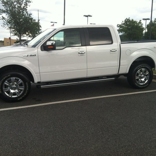 Photo taken at Jim Tidwell Ford by Cadian R. on 7/15/2012