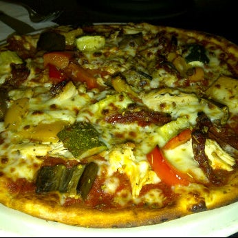 Photo taken at Pizza Express by Antonette Q. on 2/27/2012