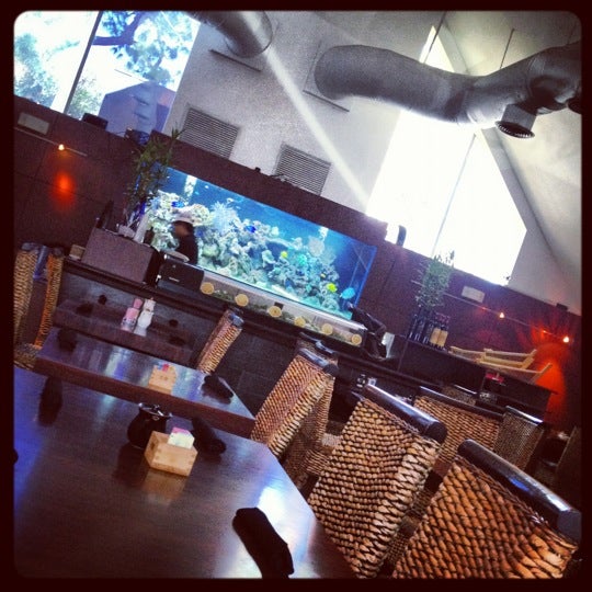Photo taken at Galanga Thai Kitchen &amp; Sushi Bar by Brian B. on 2/20/2012