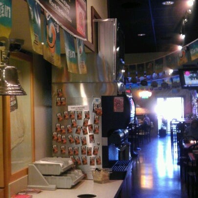 Photo taken at Woodstock&#39;s Pizza by Marisa S. on 7/10/2012