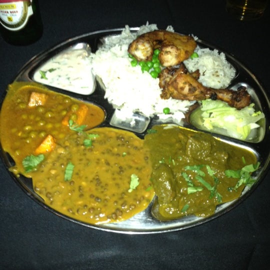 Photo taken at Gandhi India&#39;s Cuisine by Hiroshi H. on 4/16/2012