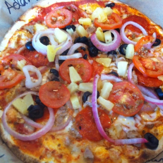 Photo taken at Mod Pizza by Adam G. on 6/20/2011