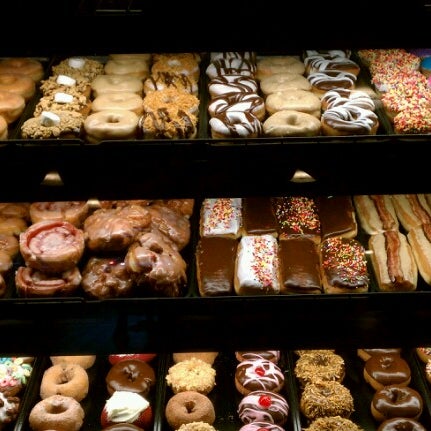 Photo taken at YoYo Donuts &amp; Coffee Bar by Stephanie R. on 6/27/2012
