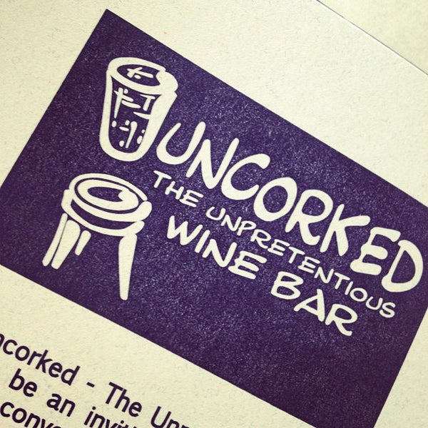 Photo taken at Uncorked Wine Bar &amp; Bistro by Dallin B. on 4/24/2012
