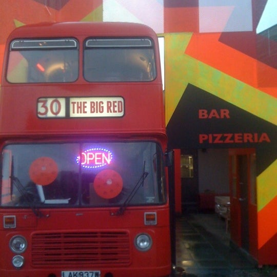 Bargain tasty pizza on a converted big red double decker bus. Awesomeness.