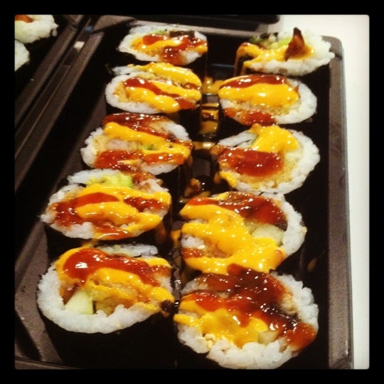Photo taken at Rollbotto Sushi by Erin B. on 1/15/2012