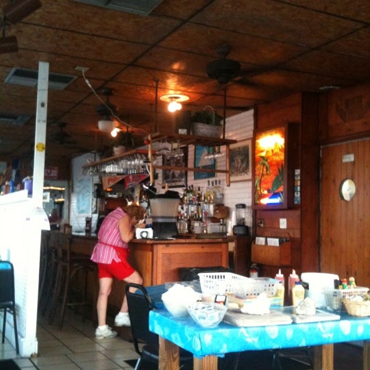 Photo taken at Cracked Conch Cafe by Doreen @. on 6/21/2011