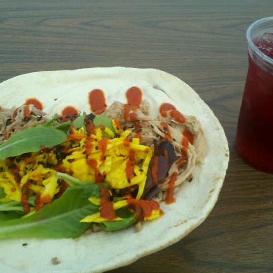 Photo taken at Guerrilla Street Food by Jennifer L. on 11/19/2011