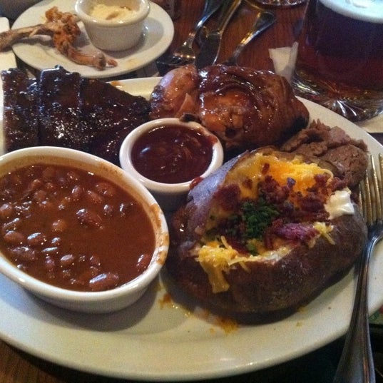 Photo taken at Back Forty Texas BBQ Roadhouse &amp; Saloon by Pat M. on 3/22/2012