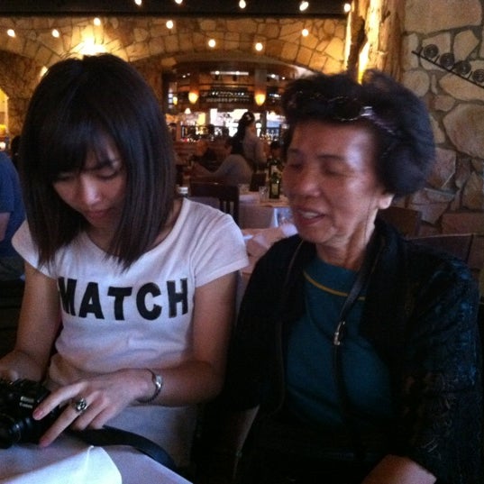 Photo taken at Romano&#39;s Macaroni Grill by lord s. on 6/25/2012