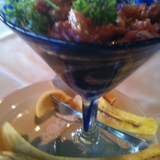 Photo taken at Simms Steakhouse by Kelli H. on 6/3/2012