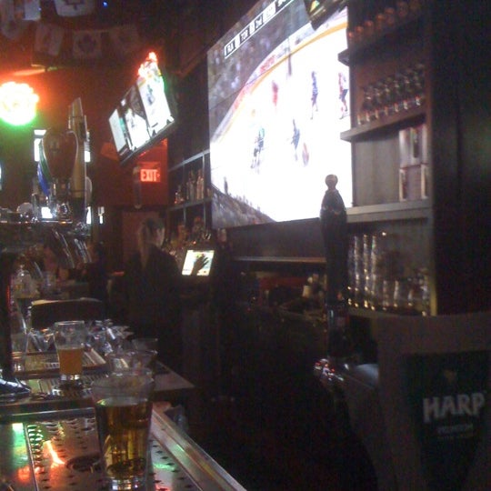 Photo taken at Hoops Sports Bar &amp; Grill- Bremner by tobias b. on 11/9/2011