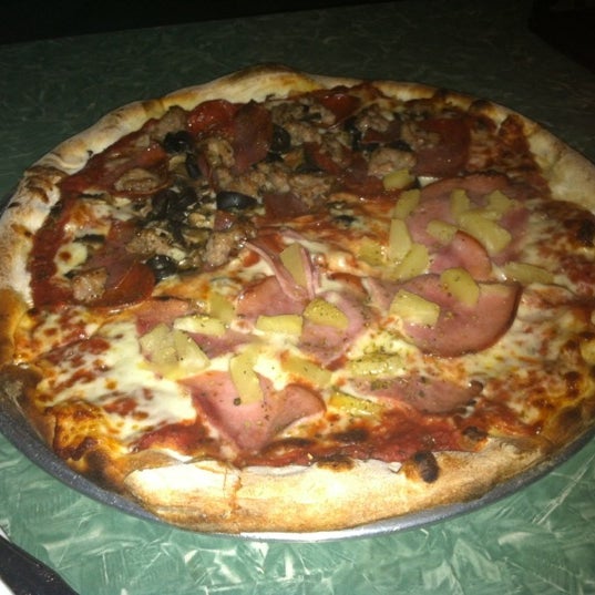 Photo taken at Victor&#39;s Pizza by Carmen on 5/4/2012