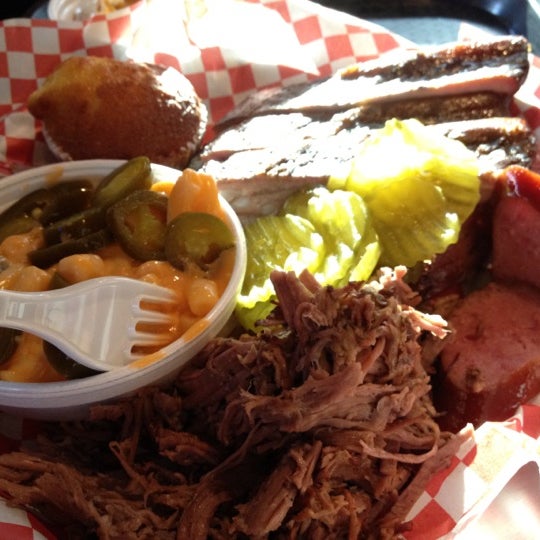 Photo taken at Dick&#39;s Bodacious BBQ by M.eve on 8/18/2012