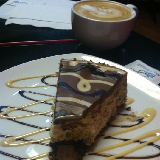 Photo taken at Dessert Oasis Coffee Roasters by Nick V. on 8/12/2012