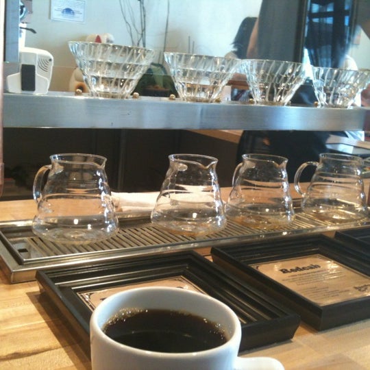 Photo taken at Barefoot Coffee by Akira I. on 3/21/2012