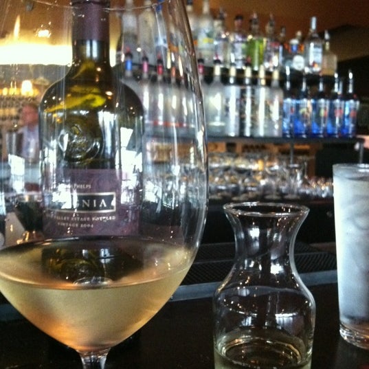 Photo taken at Cheuvront Restaurant &amp; Wine Bar by Nicole C. on 5/2/2012
