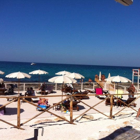 Photo taken at Coco Beach Club, Cozze - Polignano a mare by Gianfranco C. on 8/21/2012