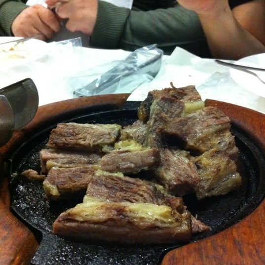 Photo taken at Costela Premium Ribs by Mauricio K. on 6/1/2012