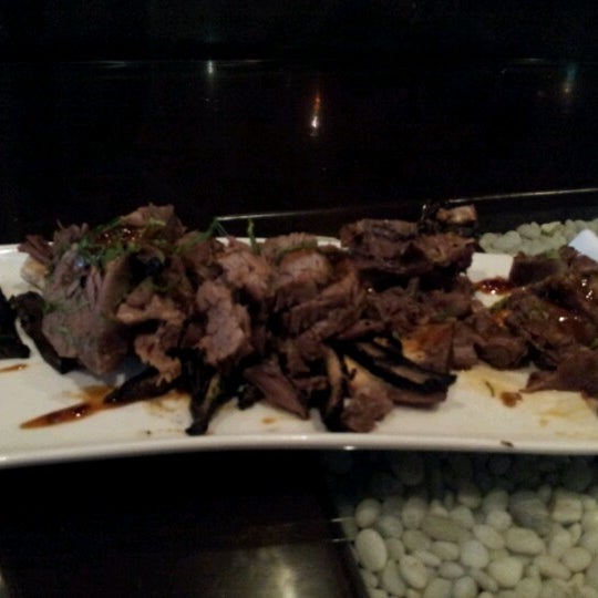 Foto tirada no(a) Wasabi Asian Plates &amp; Sushi Bar por Michelle S. em 7/3/2012
