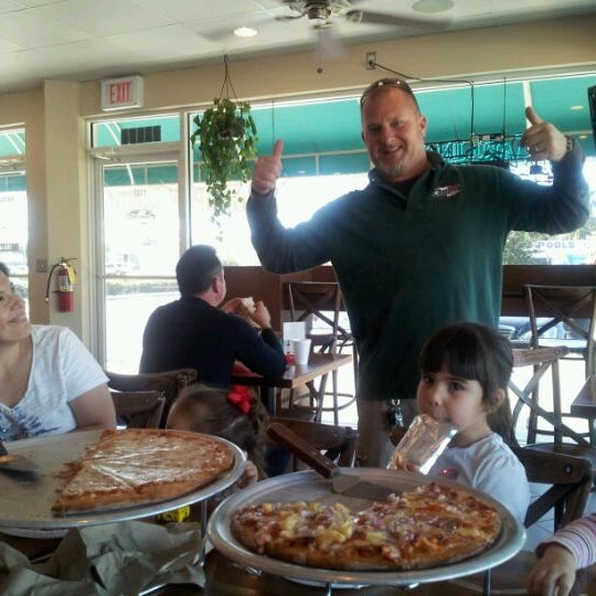 Photo taken at Cipriano&#39;s Pizzeria &amp; Restaurant by JJ V. on 12/28/2011