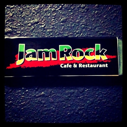 Photo taken at JamRock Cafe &amp; Restaurant by Junichi M. on 8/11/2011