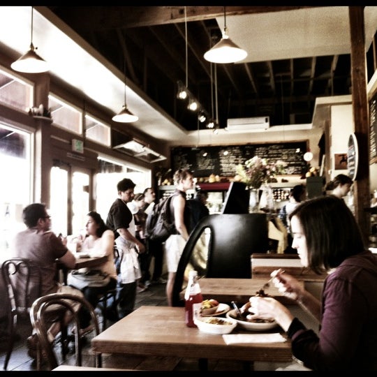 Photo taken at Atmosphere Cafe by Michael M. on 3/3/2012