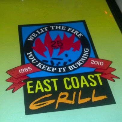 Photo taken at East Coast Grill &amp; Raw Bar by Al S. on 5/12/2012