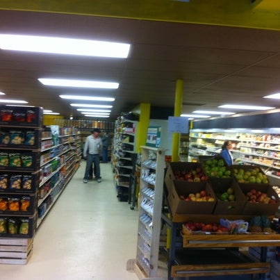 Photo taken at Pogue&#39;s Run Grocer by Jay P. on 12/31/2010