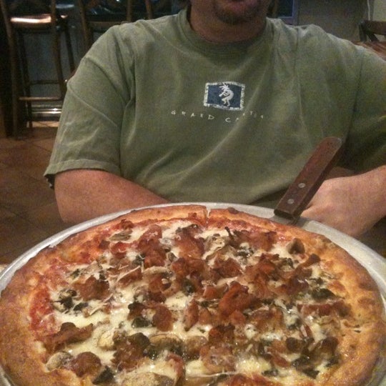 Photo taken at Cipriano&#39;s Pizzeria &amp; Restaurant by Stacey G. on 1/24/2012