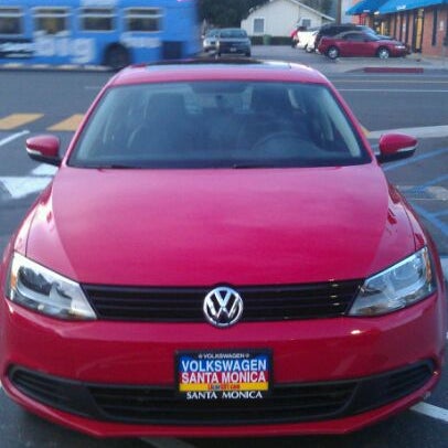 Photo taken at Volkswagen Santa Monica by Mel on 1/11/2012