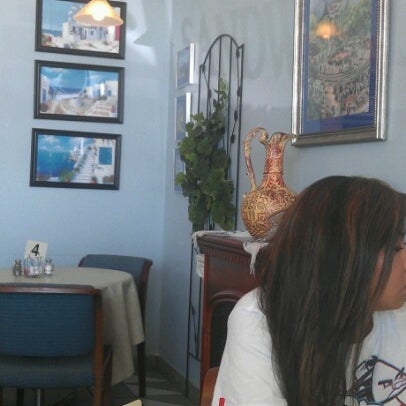 Foto diambil di Atheneos Greek Village Cafe oleh Michael A. pada 7/29/2012