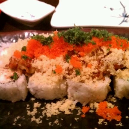 Photo taken at Sushi Delight by Miriam W. on 12/1/2011