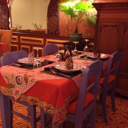 Photo taken at Amok Restaurant by Pat C. on 12/16/2011